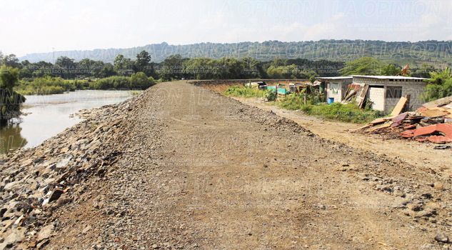 Confían en el muro de contención Confían en el muro de contención
