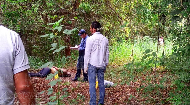 Hallan cadáver taxista