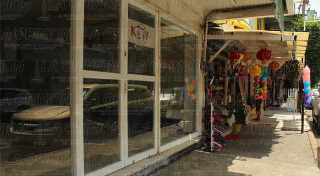 por-recesion-cierran-400-comercios