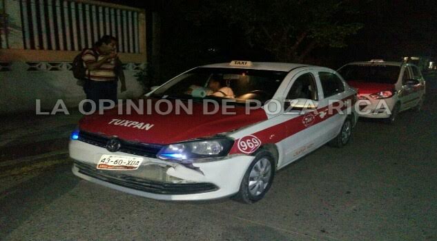 Mujer lesionada en choque Mujer lesionada en choque