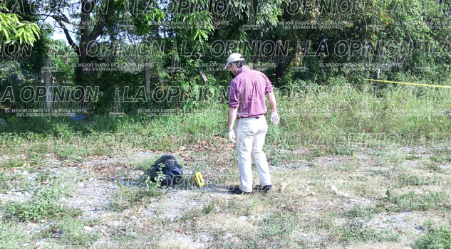 Hallan embolsado el cuerpo de una mujer Hallan embolsado el cuerpo de una mujer