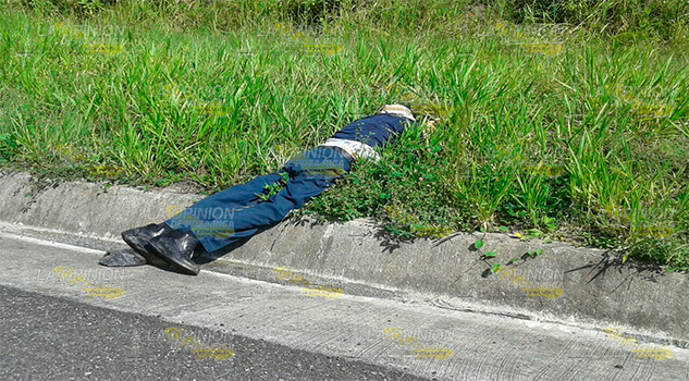 Encuentran una persona ejecutada sobre la autopista
