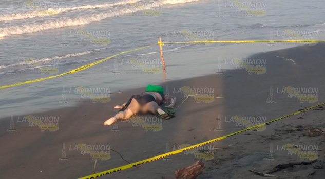 Hallan cadáver en la playa EL CADÁVER