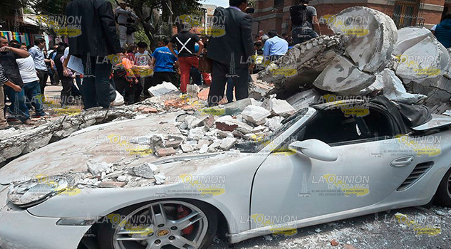 Asciende cifra de muertos por sismo