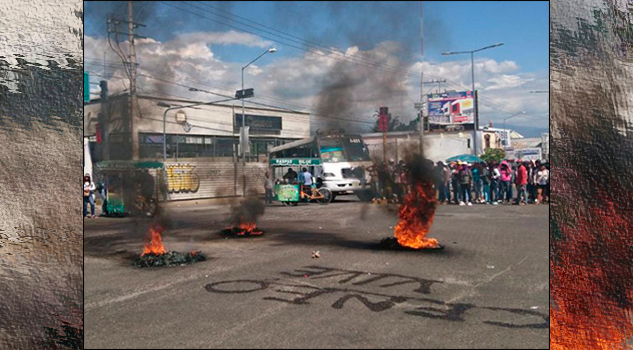 Bloquean calles de Oaxaca presuntos normalistas Bloquean calles