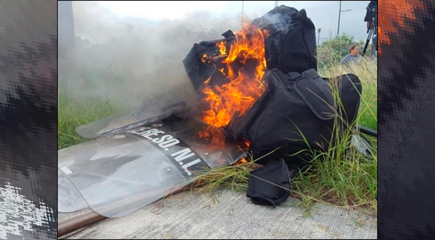 Por zozobra en Penal de Cadereyta, familiares de reos queman equipo policiaco Por zozobra en Penal de Cadereyta, familiares de reos queman equipo policiaco