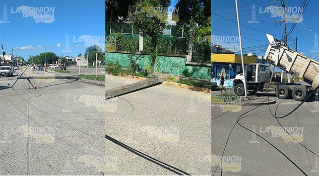 Camión de volteo tumba dos postes de CFE