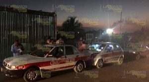 Mujer embarazada resulta lesionada en choque de taxis Taxistas Chocan Alcance