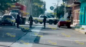 Balean a ciclista en la ribera