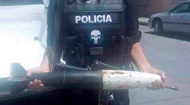 Mujer intenta canjear un misil por vales en Chihuahua Mujer intenta canjear un misil por vales en Chihuahua