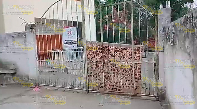Aparece manta en escuela de la comunidad del Chote, con mensaje amenazador