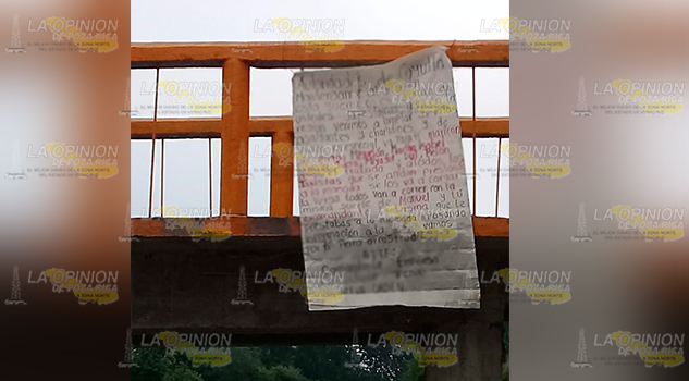 Aparece manta con mensaje intimidatorio hacia algunas personas de Coyutla