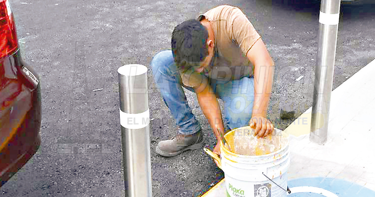 Carpeta asfáltica en calle 8 Norte