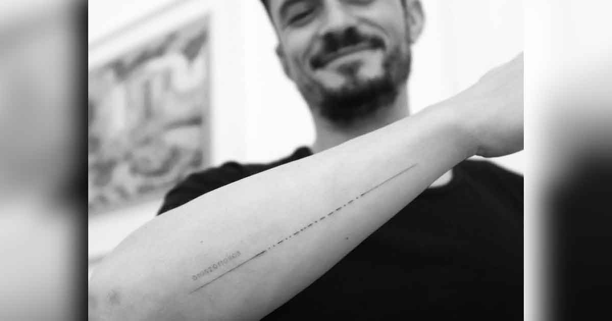 Orlando Bloom corrige tatuaje en homenaje a su hijo Flynn