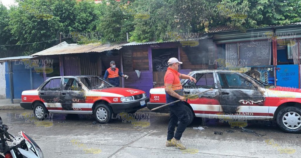 Incendian dos taxis en plena zona centro