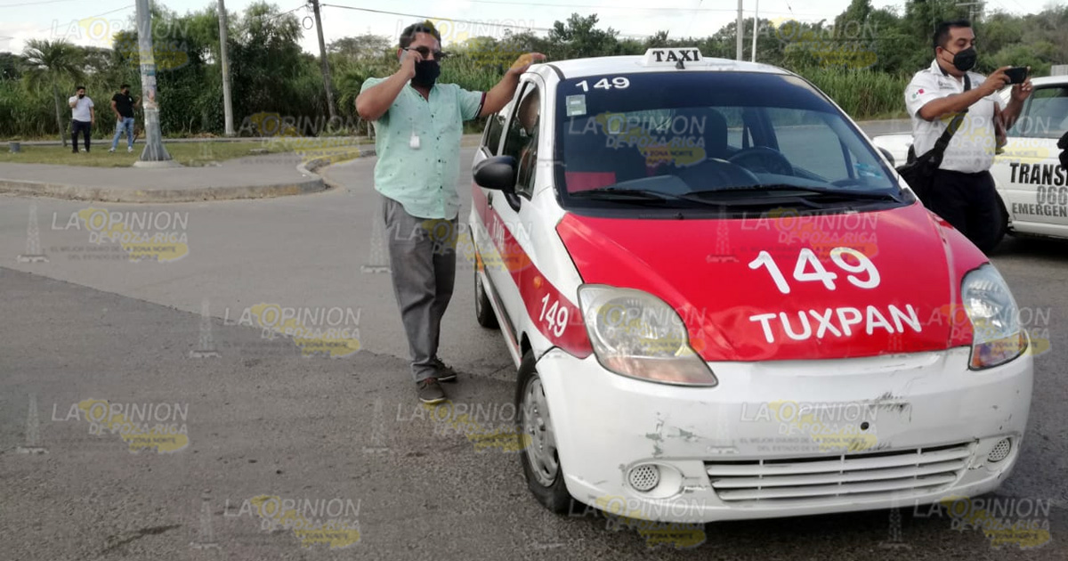 Motociclista derribado por un taxi