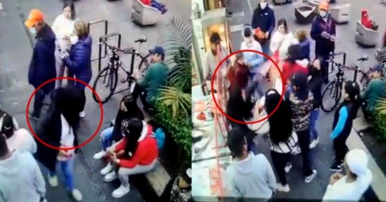 Mujer escupe a pareja gay por darse un beso