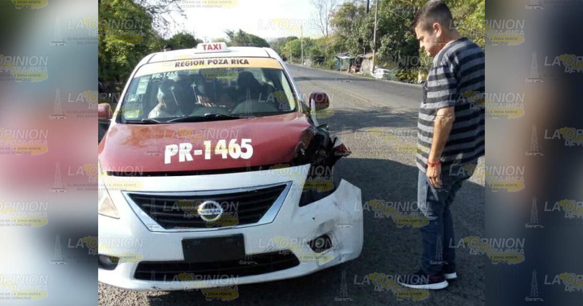 Encontronazo entre un taxi y coche particular
