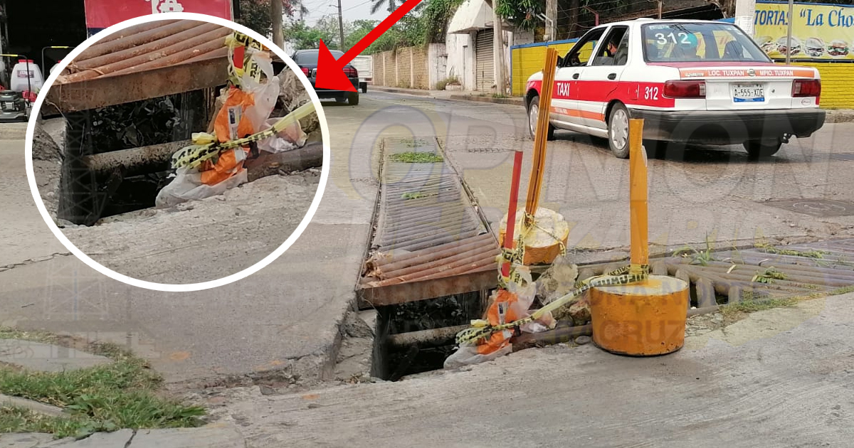 Peligro por rejilla de un dren pluvial rota, en calles de Tuxpan