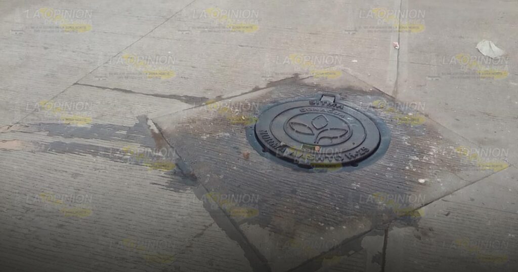 Olla ensolvada en red de drenaje