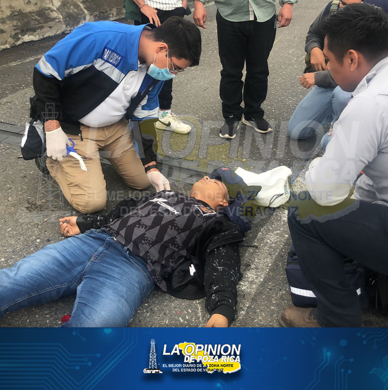 Motociclista derrapado en distribuidor vial