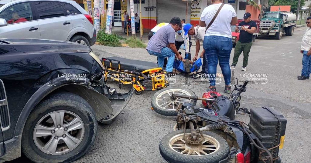 Camioneta americana derribó a motociclista Camioneta americana derribó a motociclista