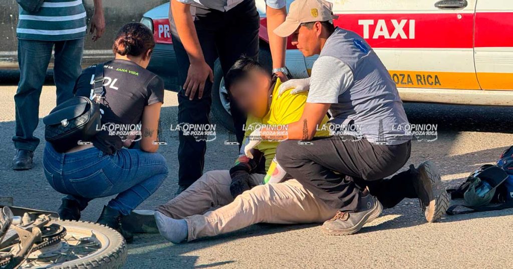 Imprudente taxista embiste a motociclista Imprudente taxista embiste a motociclista